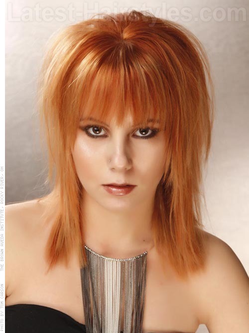 bright-red-hair-medium-layered A bright red hair color with medium layeres