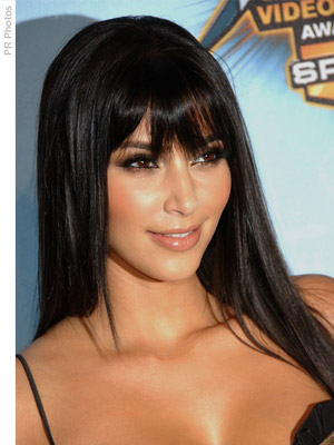 Kim Kardashian with long straight hair with bangs How to style