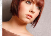 Short red bob hairstyle with wispy bangs