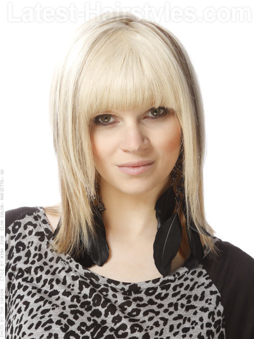 Classic Blonde Shag Cut with Long Bangs Front View