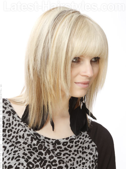 Classic Blonde Shag Cut with Long Bangs