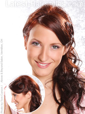 A soft side faux pony with pin curls. Pin up girl style side ponytail for