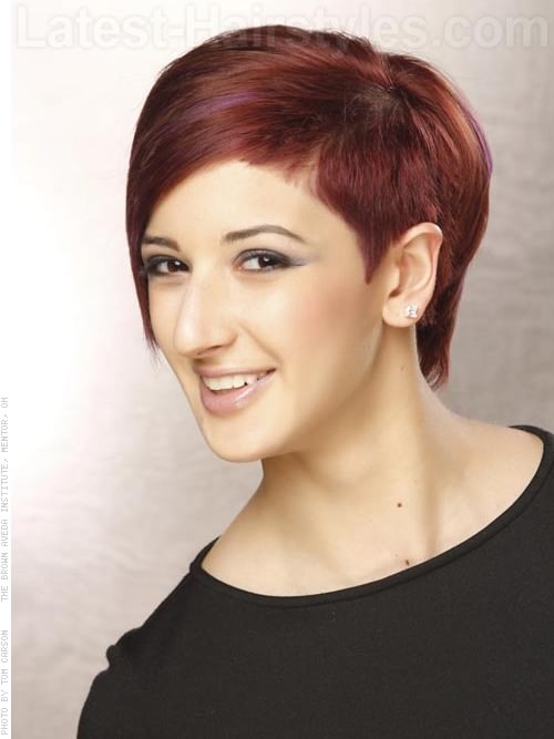 Asymmetrical Auburn Cut Over the Ears Asymmetrical Auburn Cut Over the Ears