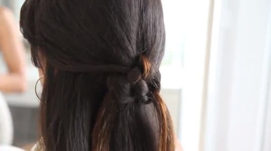 knotted half up half down hairstyle