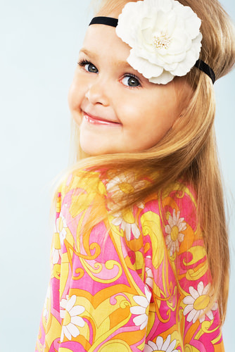 Hippie Girl Fun Straight Blonde Hairstyle with Big Flower Hair Accessory for a Little Girl Hippie Girl Fun Straight Blonde Hairstyle with Big Flower Hair Accessory for a Little Girl