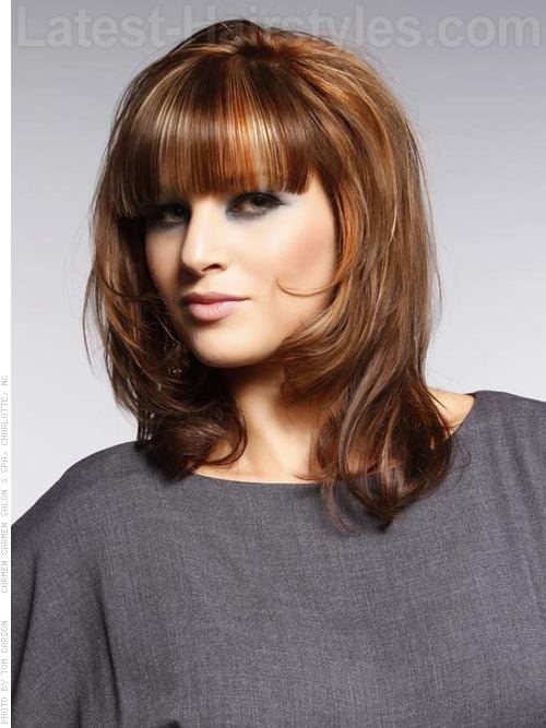 strictly bangs highlighted medium cut with long bangs 