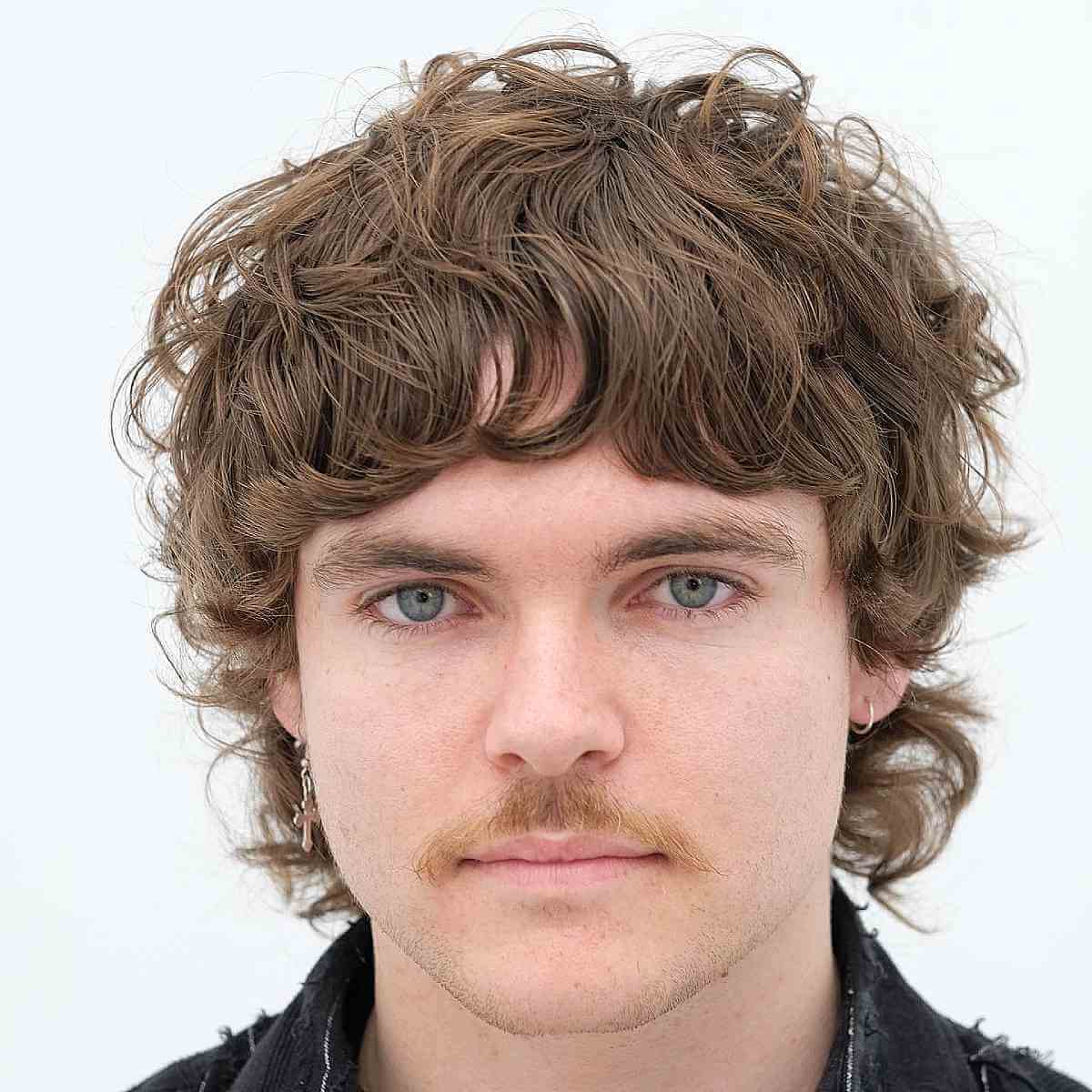 70s-Inspired Shag for Men with Curly Hair