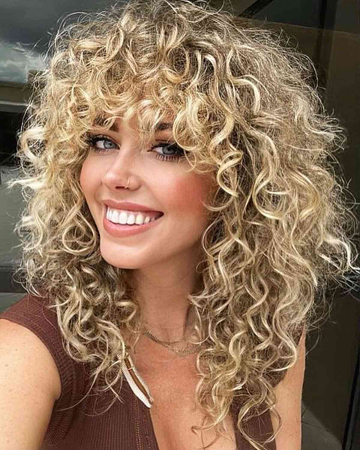 80s Textured Curly Shag with Bangs on Medium Haircut