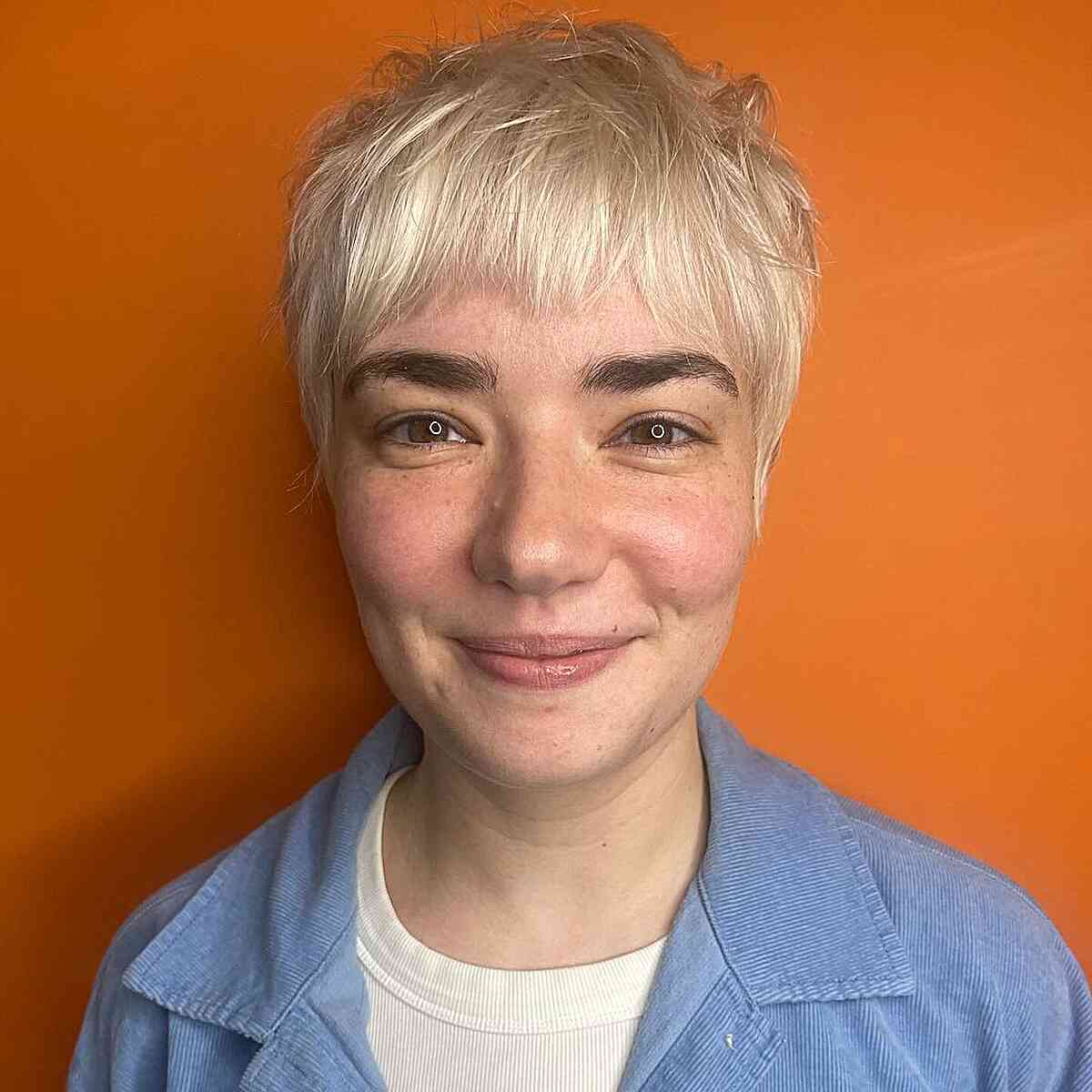 90s-Inspired Bleach Blonde Pixie with Thin Bangs