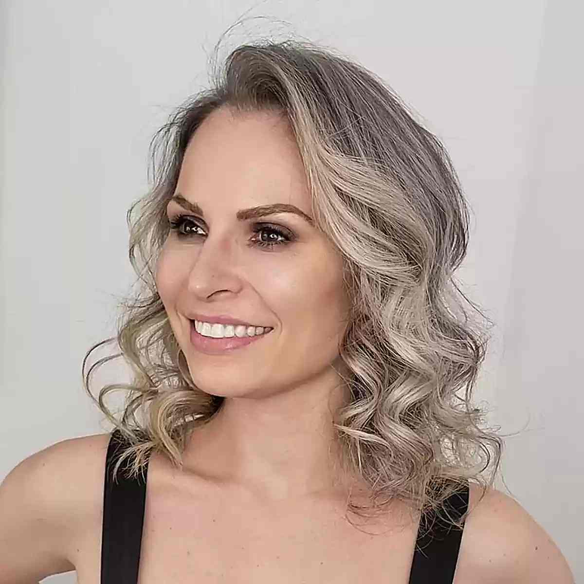 Adorable Ash Blonde Curls for Shoulder-Length Hair
