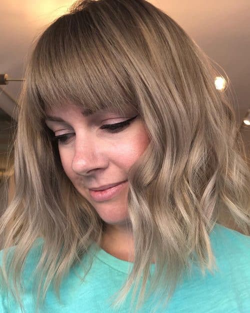 A long bob amongst bangs is a haircut that ends anywhere betwixt the shoulder together with collarbone  22 Chic Long Bob amongst Bangs