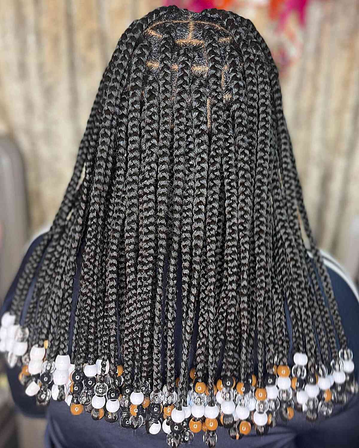 Mid back Beaded Knotless Jumbo Braids