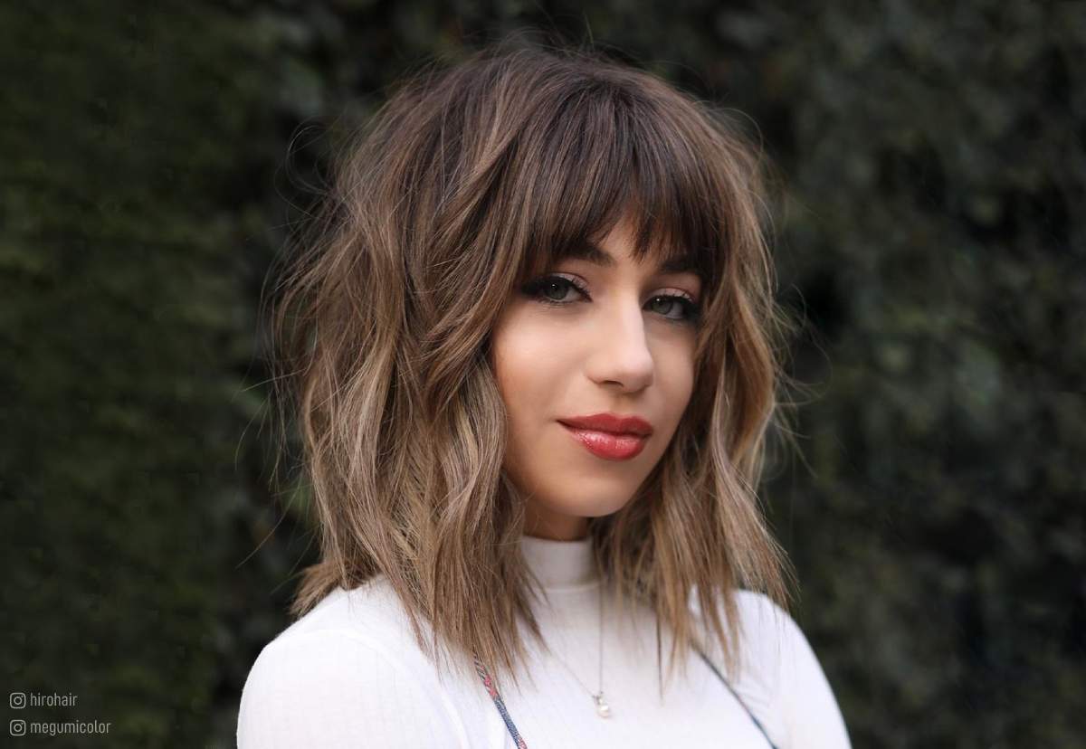 Image of Shoulder length shaggy bob with blunt bangs