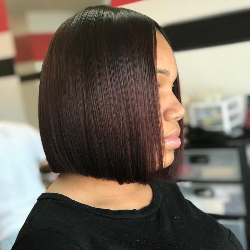 s parted downwards from the centre of the caput fifteen Incredible Middle Part Bob Ideas for Black Women
