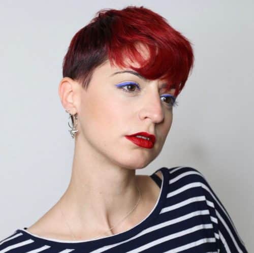 warm as well as intense shade of ruby-red dyed onto the pilus inwards the cast of highlights sixteen Stunning Bright Red Hair Colors to Get You Inspired