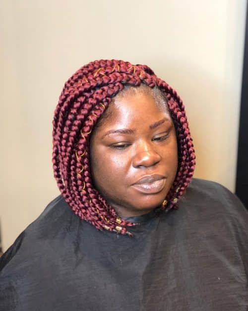 Burgundy box braids are a protective hairstyle dyed inwards a darker shade of ruddy in addition to divided i The xiii Hottest Burgundy Box Braids