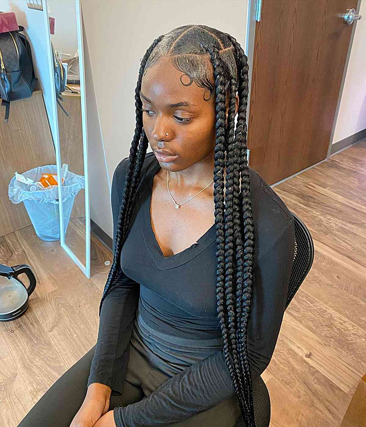 Center-Parted Long Large Knotless Braids with Sleek Edges