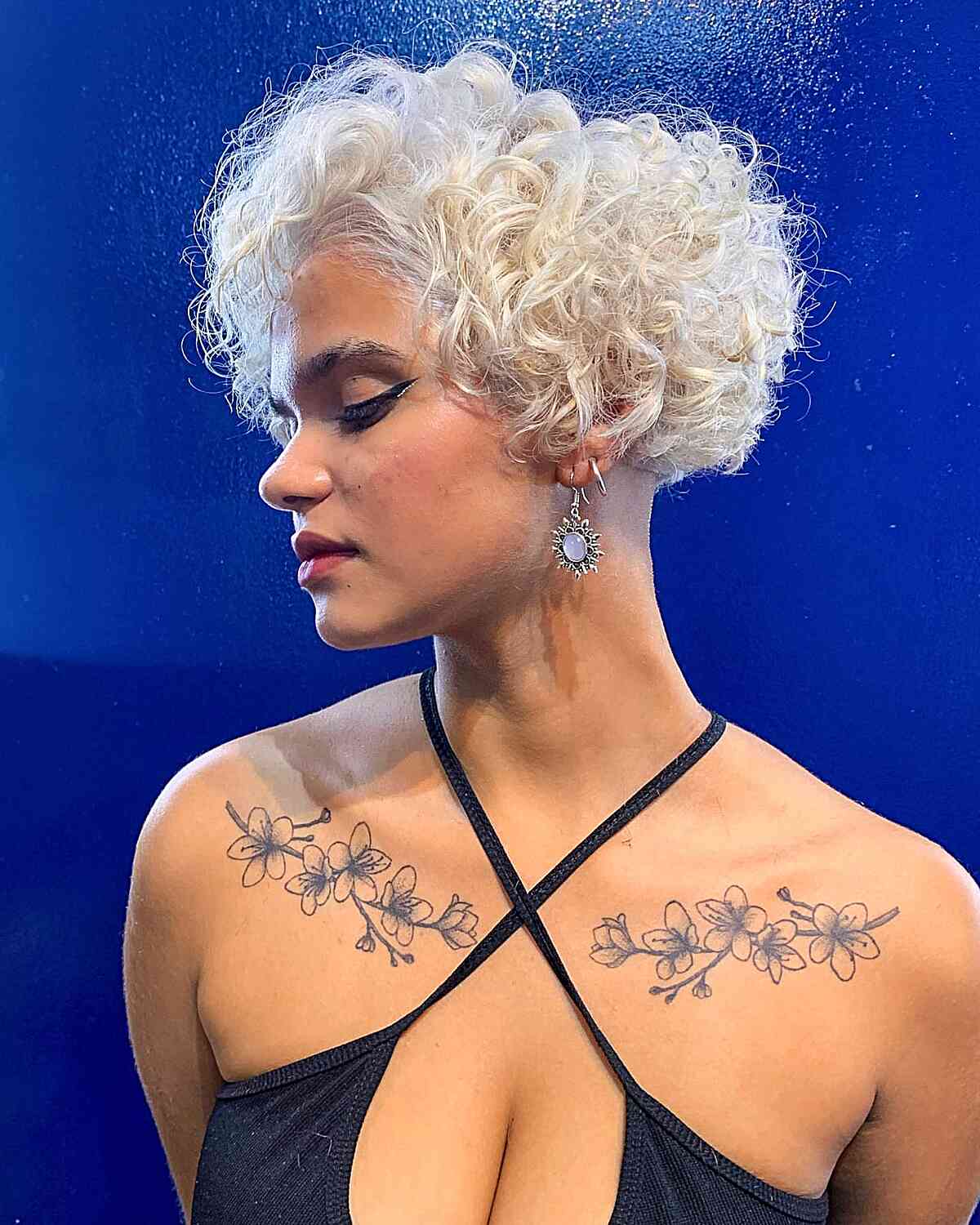 Cheek-Length Curls on White Blonde Thick Hair