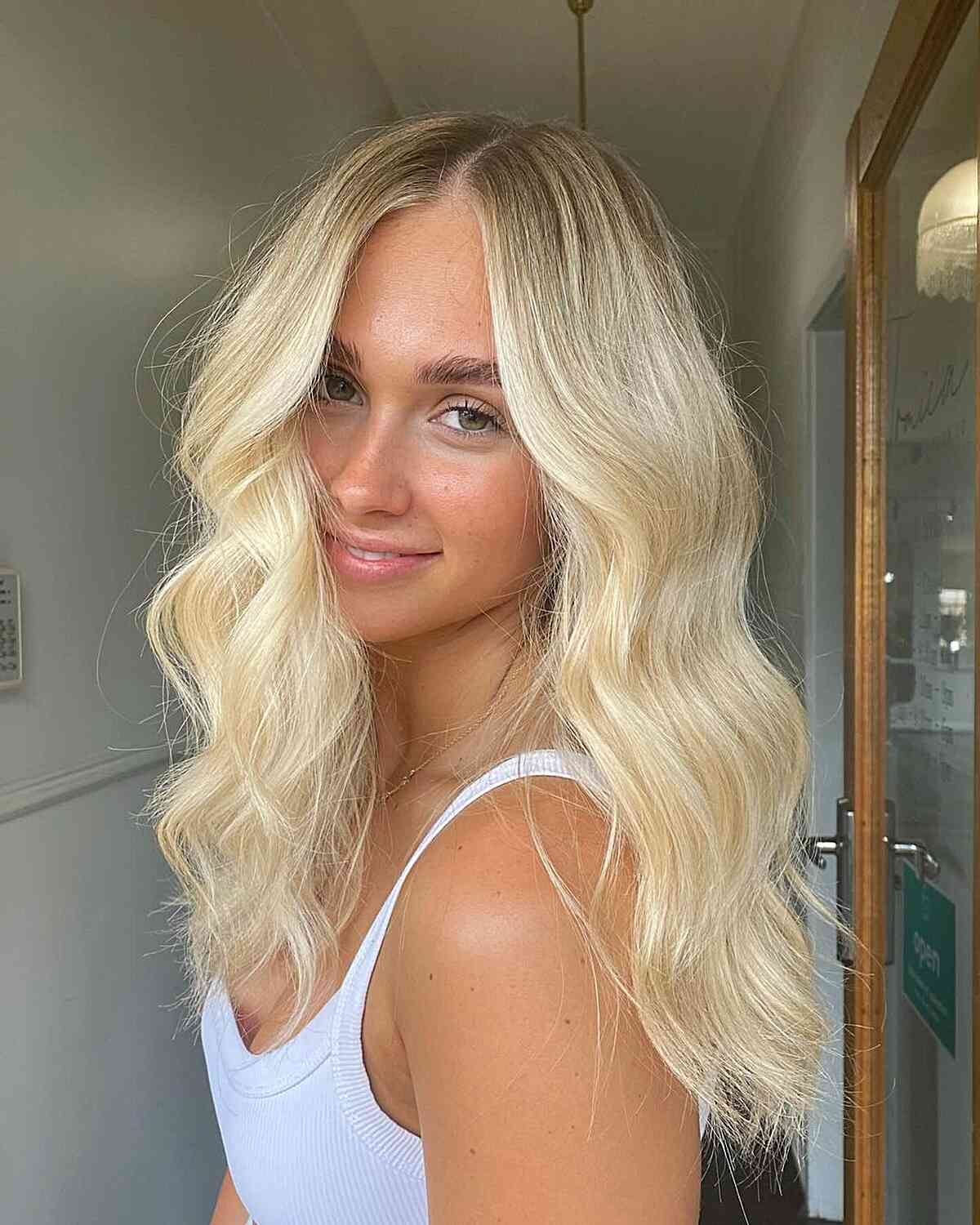 Chest-Length Soft Beachy Waves with Off-Center Part