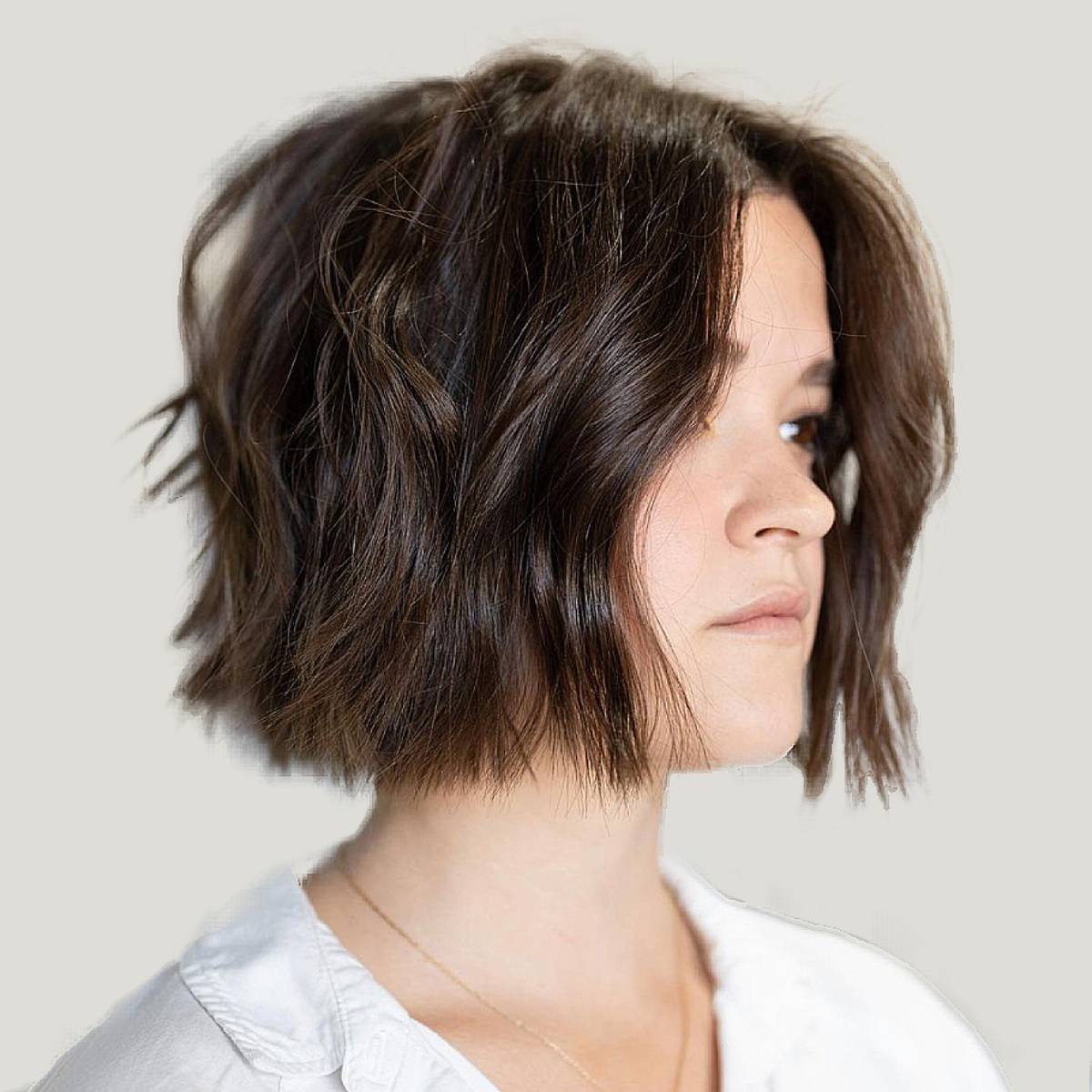 Image of Short curly shaggy bob with chin-length cut