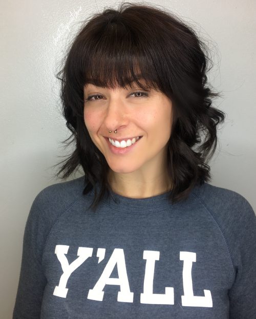 Adding bangs to a hairstyle is similar adding a cherry to the laissez passer on of an H2O ice cream sunday 53 Medium Hairstyles With Bangs: Our Latest Faves!