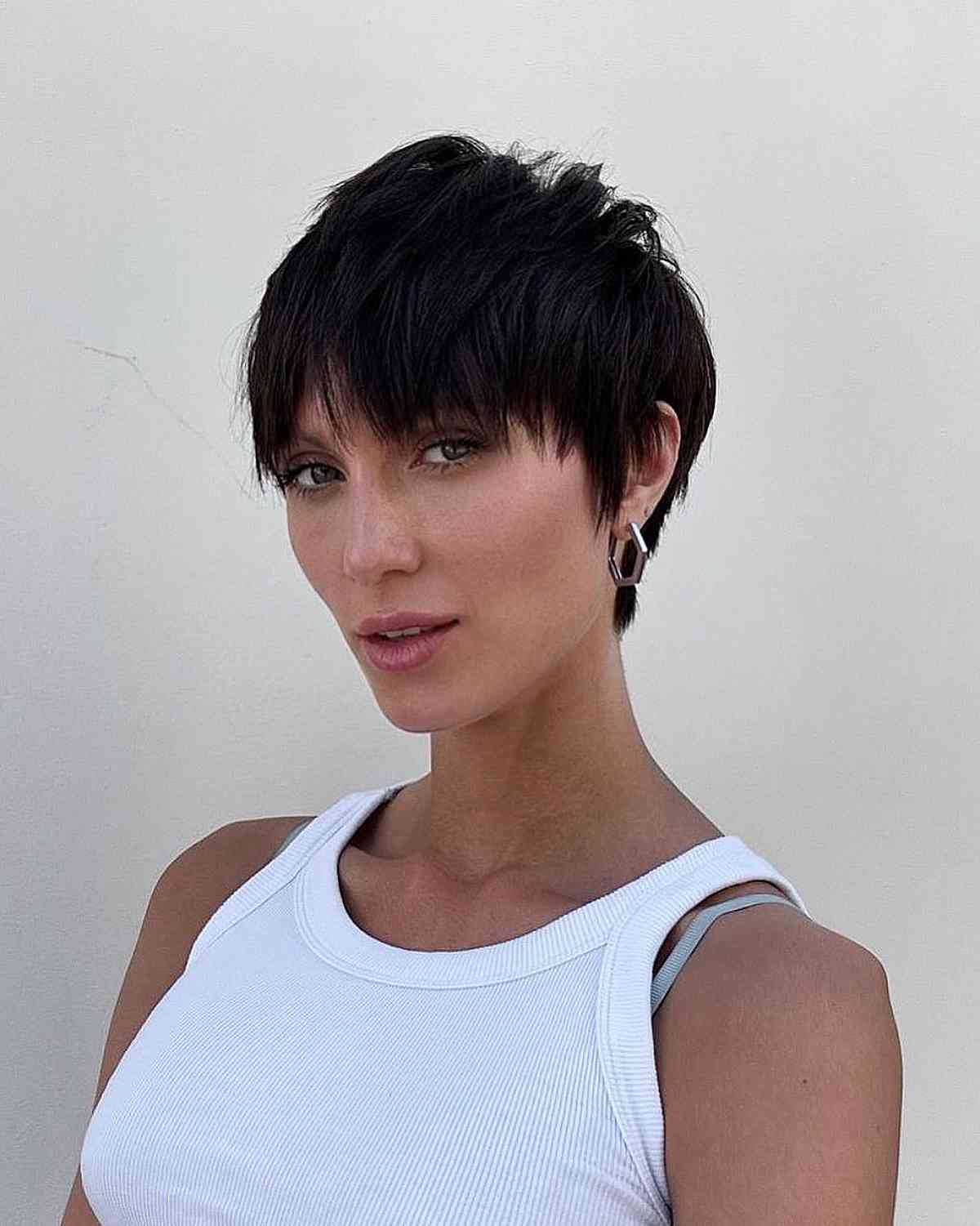 Choppy Layered Pixie Haircut with Straight Bangs