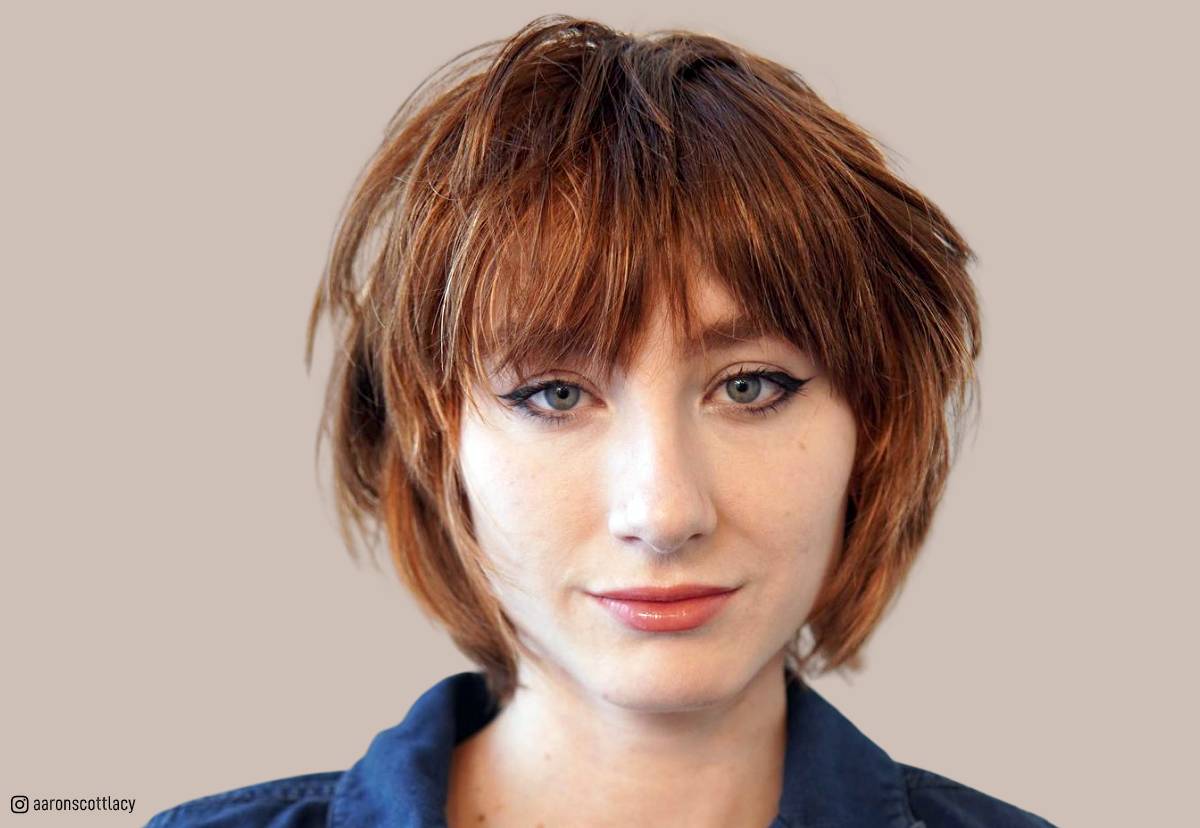 Image of Short shaggy bob with bangs for thin hair