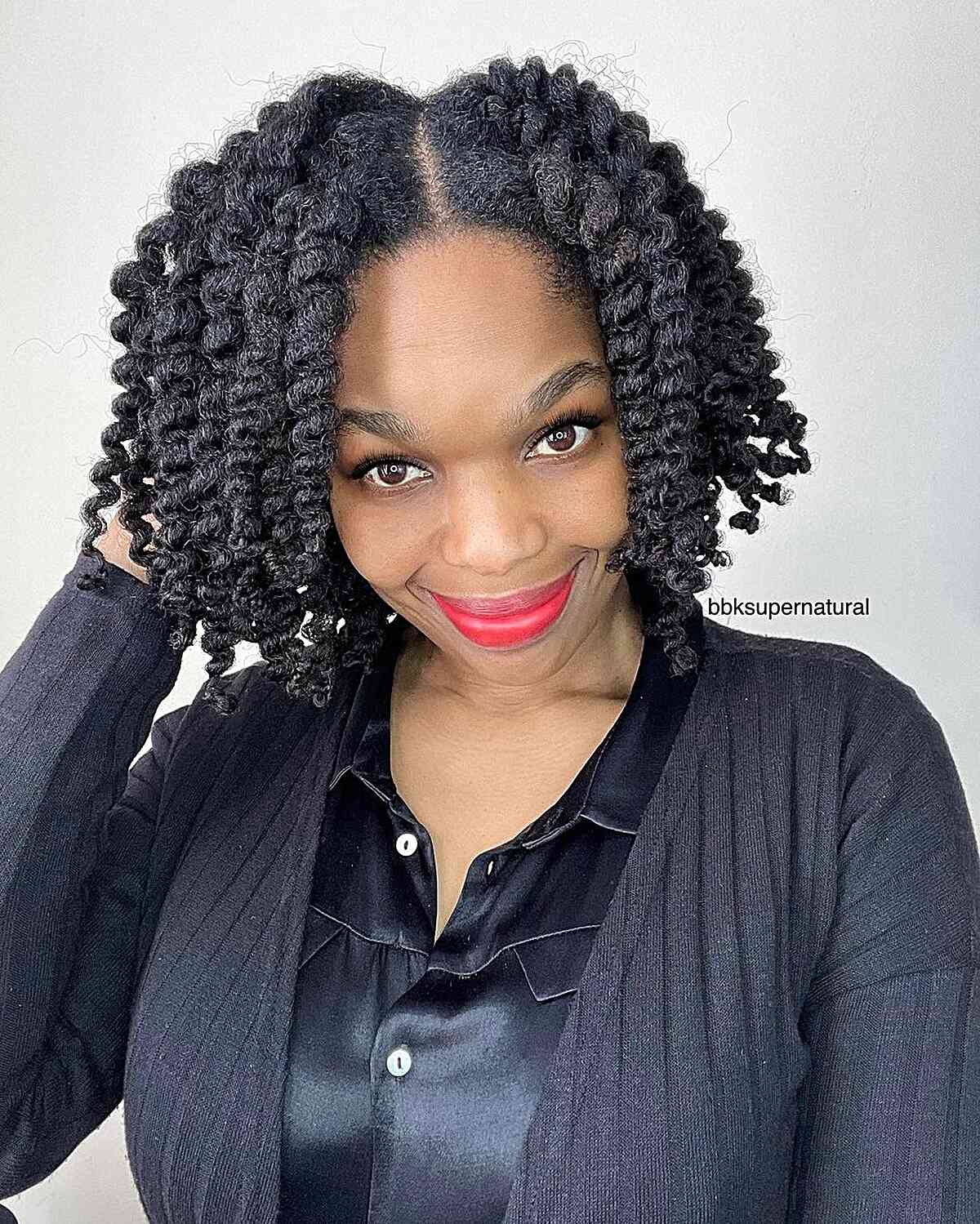 Chin-Length Chunky Twist Out Hair with Center Part
