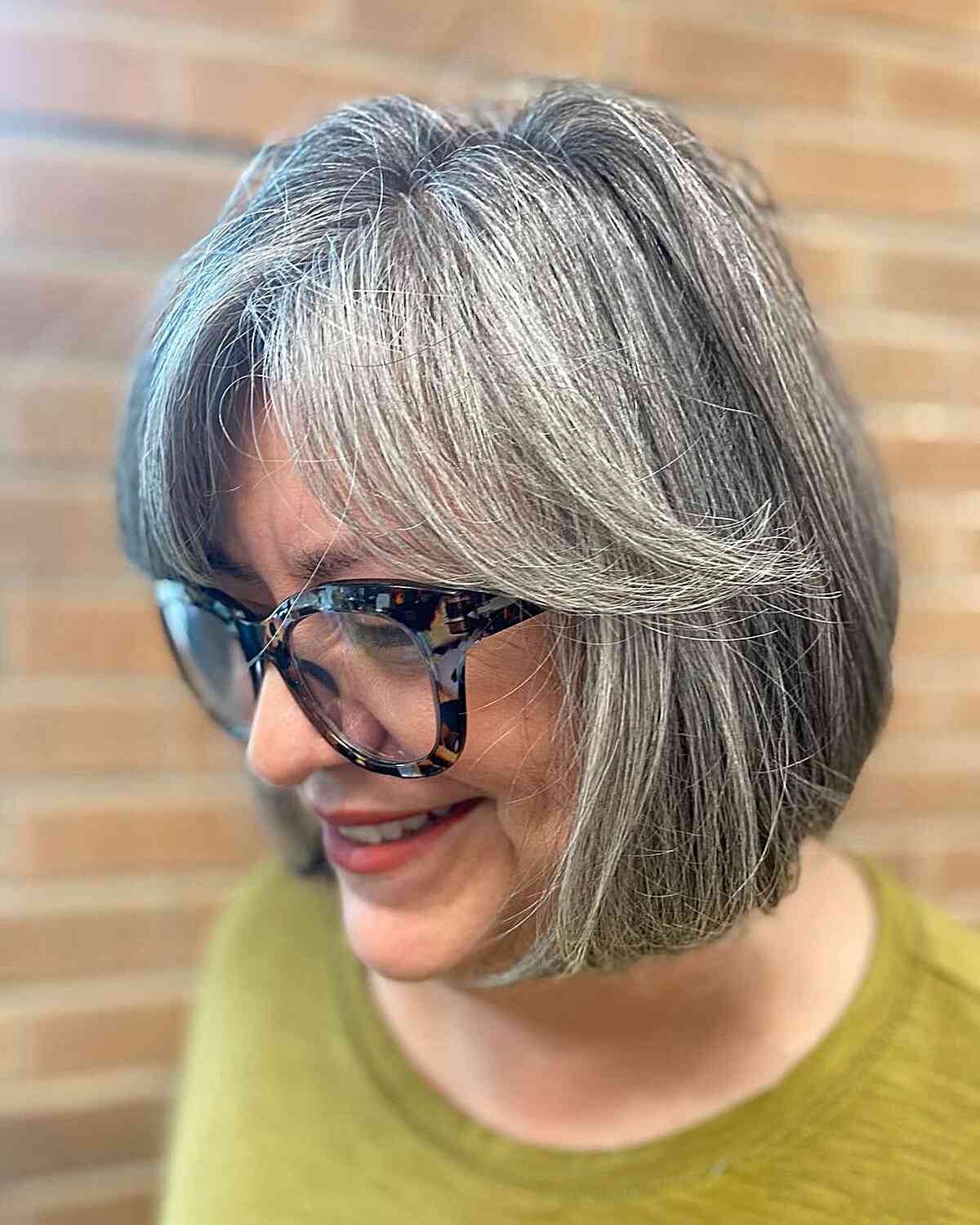 Classic Grey Bob with Feathered Bangs for Ladies Over 60