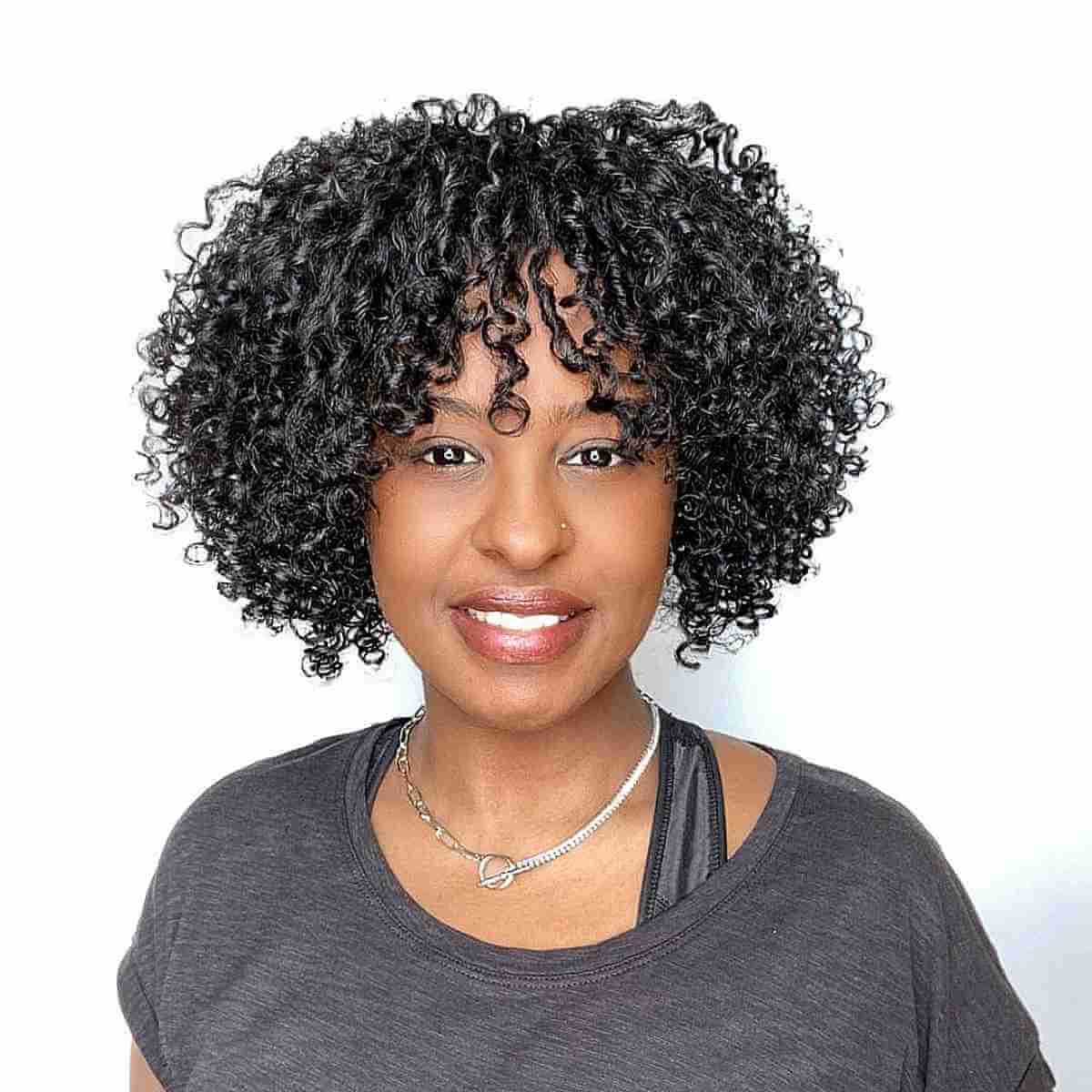 Glossy Curly Bob with Bangs