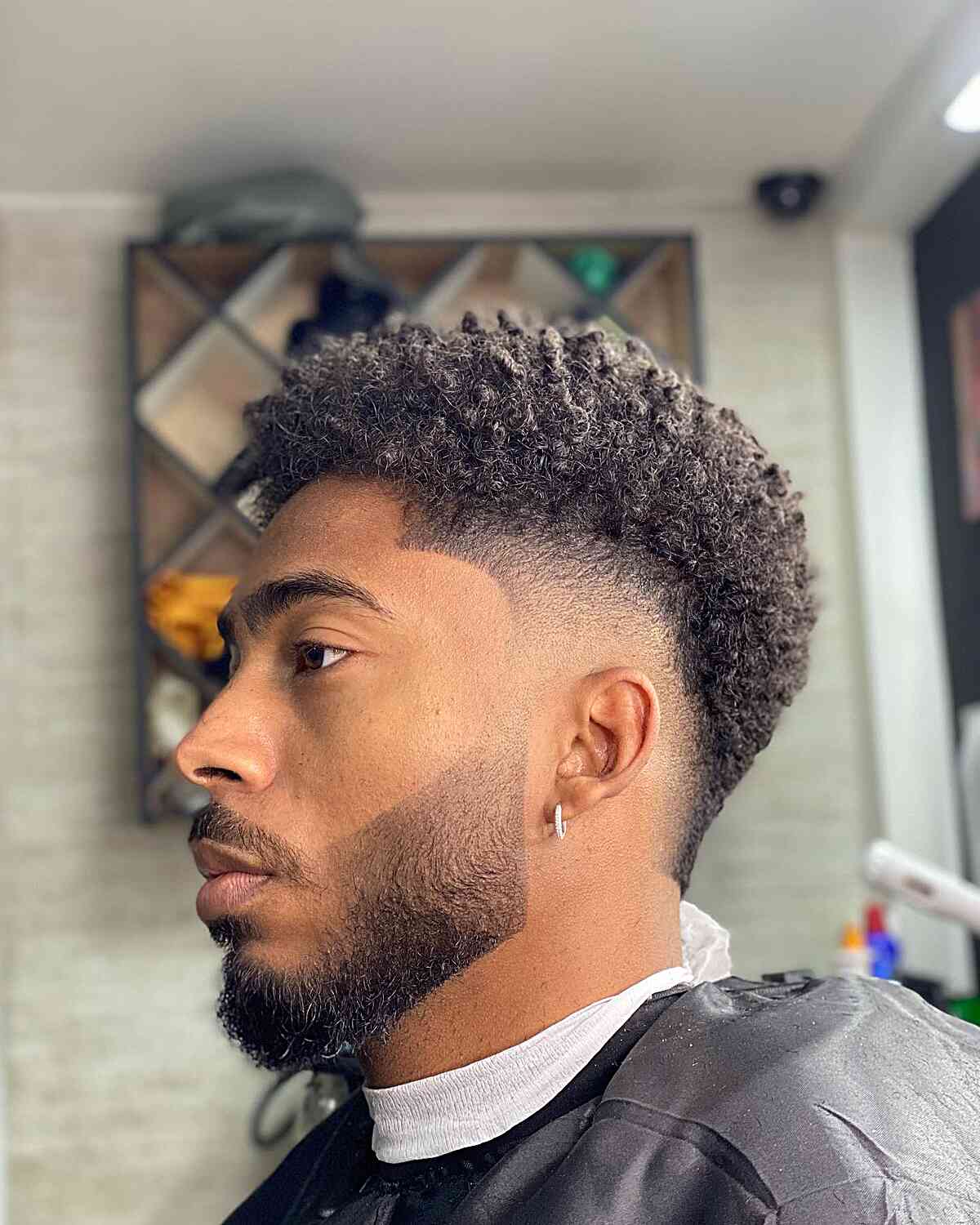 Curly Faux Hawk + Burst Fade