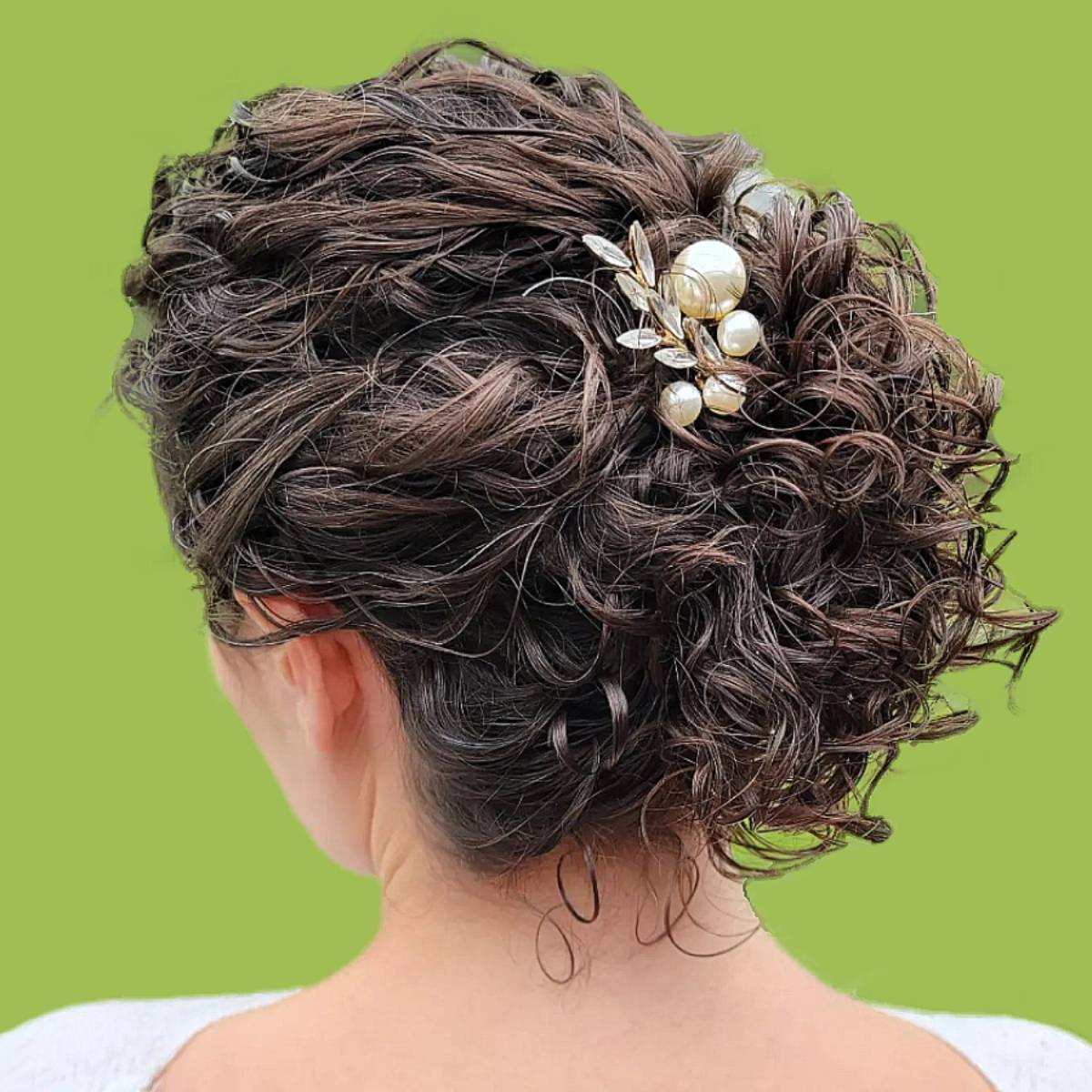 Image of Curly updo hairstyle for oval faces