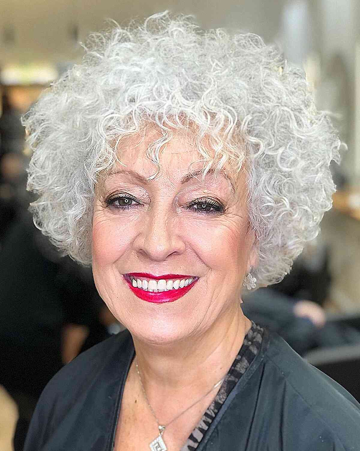 Curly Round Bob with Piece-y Bangs for thick-haired women over sixty