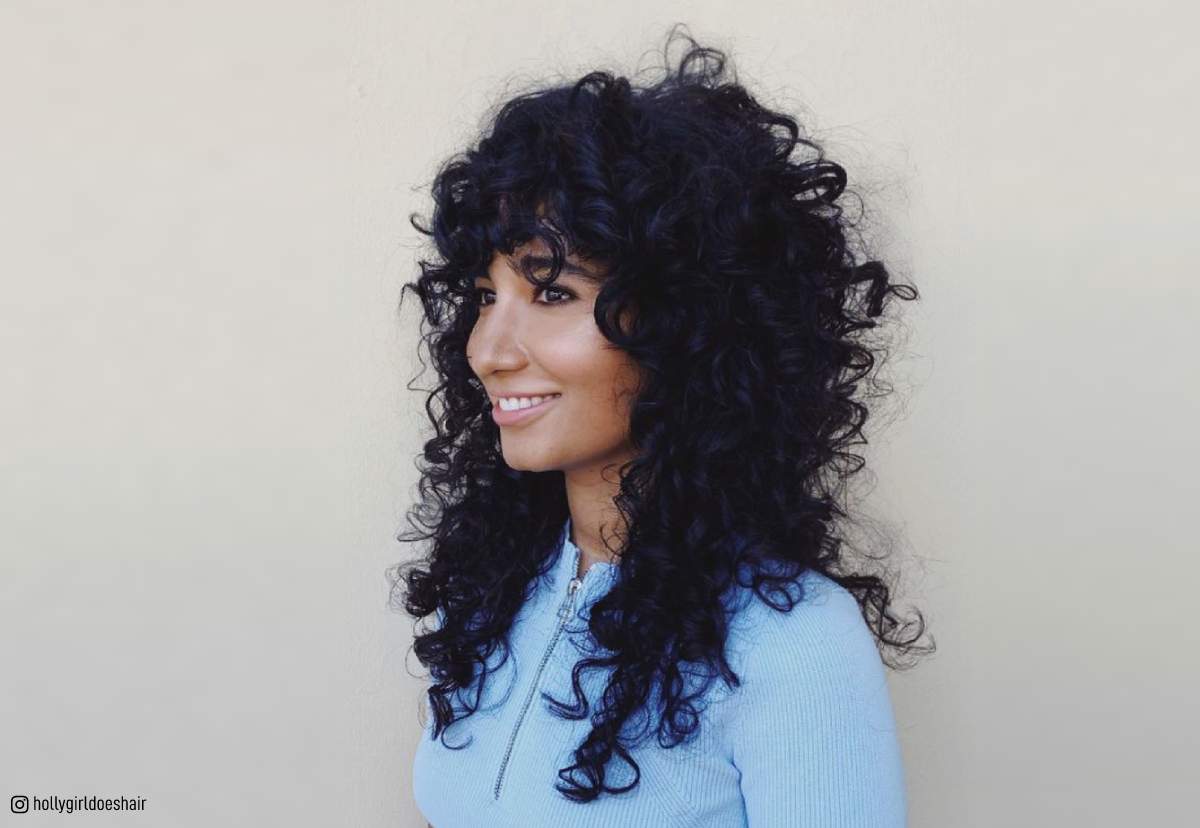 Image of Shaggy natural curly hair young woman