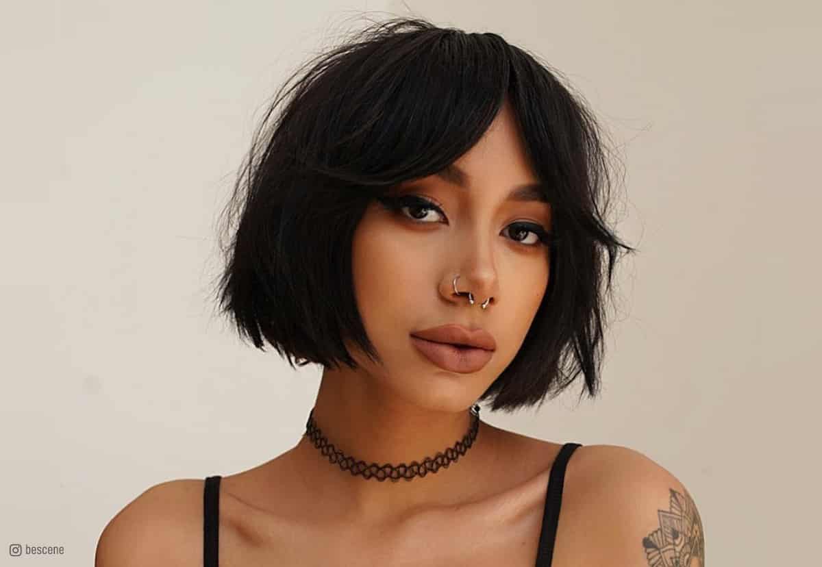 Image of Blunt bob with curtain bangs haircut for ladies