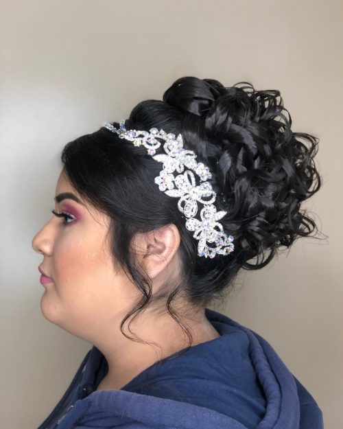 A quinceanera hairstyle is whatever hairdo worn on a daughter xv Stunning Quinceanera Hairstyles to Consider