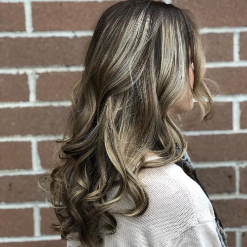 Dark pilus amongst blonde highlights is a pilus color combination that has lightened pieces or 21 Inspiring Examples of Dark Hair amongst Blonde Highlights