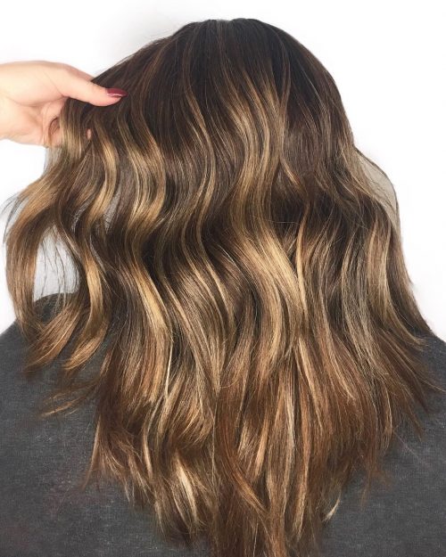 Dark pilus amongst blonde highlights is a pilus color combination that has lightened pieces or 21 Inspiring Examples of Dark Hair amongst Blonde Highlights