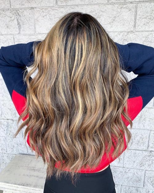 Dark pilus amongst blonde highlights is a pilus color combination that has lightened pieces or 21 Inspiring Examples of Dark Hair amongst Blonde Highlights