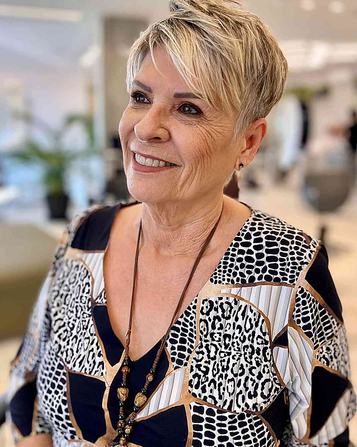 Dimensional Pixie with Side Bangs for 60-year-olds with thicker mane