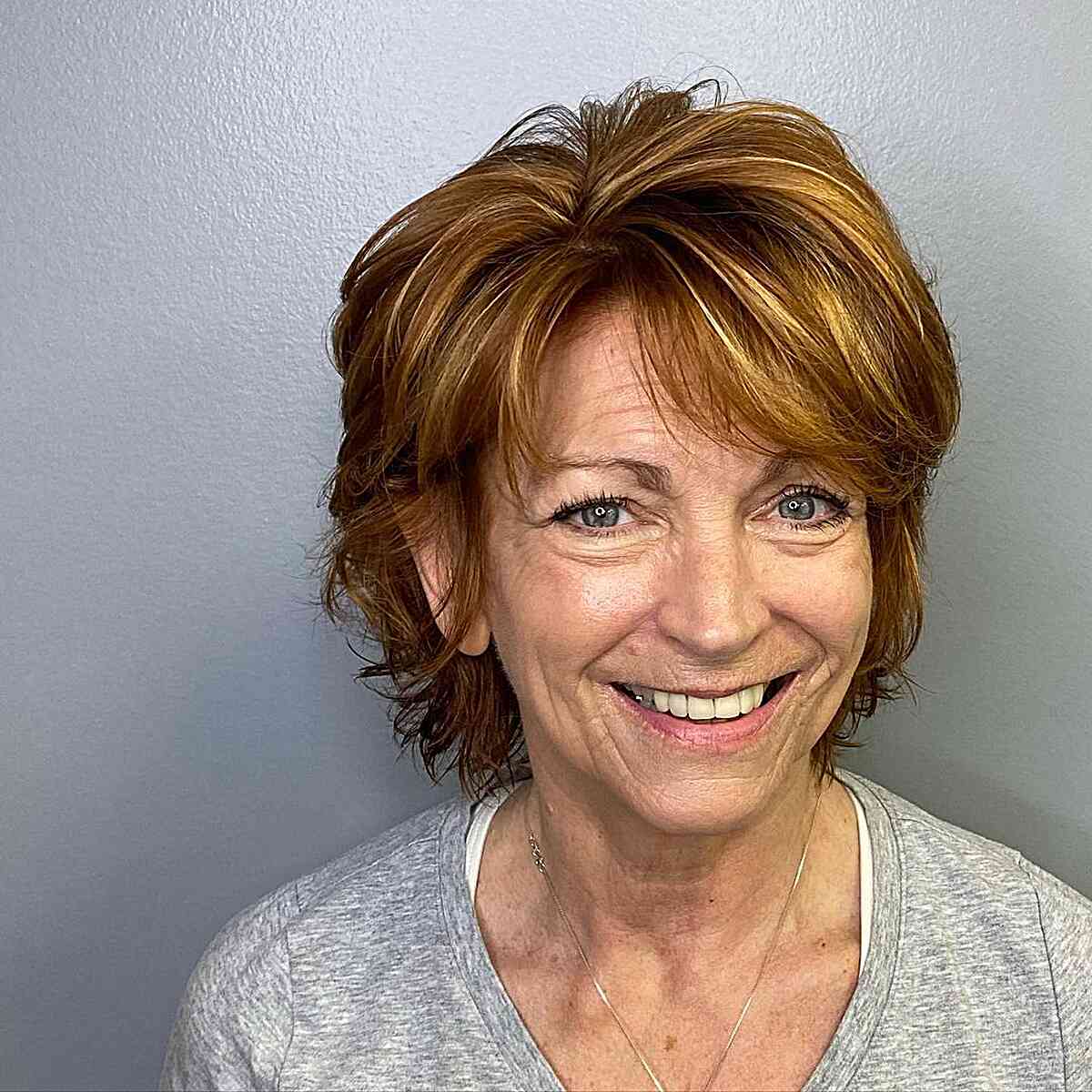 Dimensional Short Shag with Swoopy Bangs for Women Over 60 and Up
