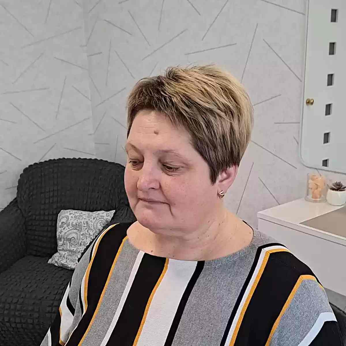 Edgy Razored Thick Pixie Cut for Women Over 60 with Round Faces