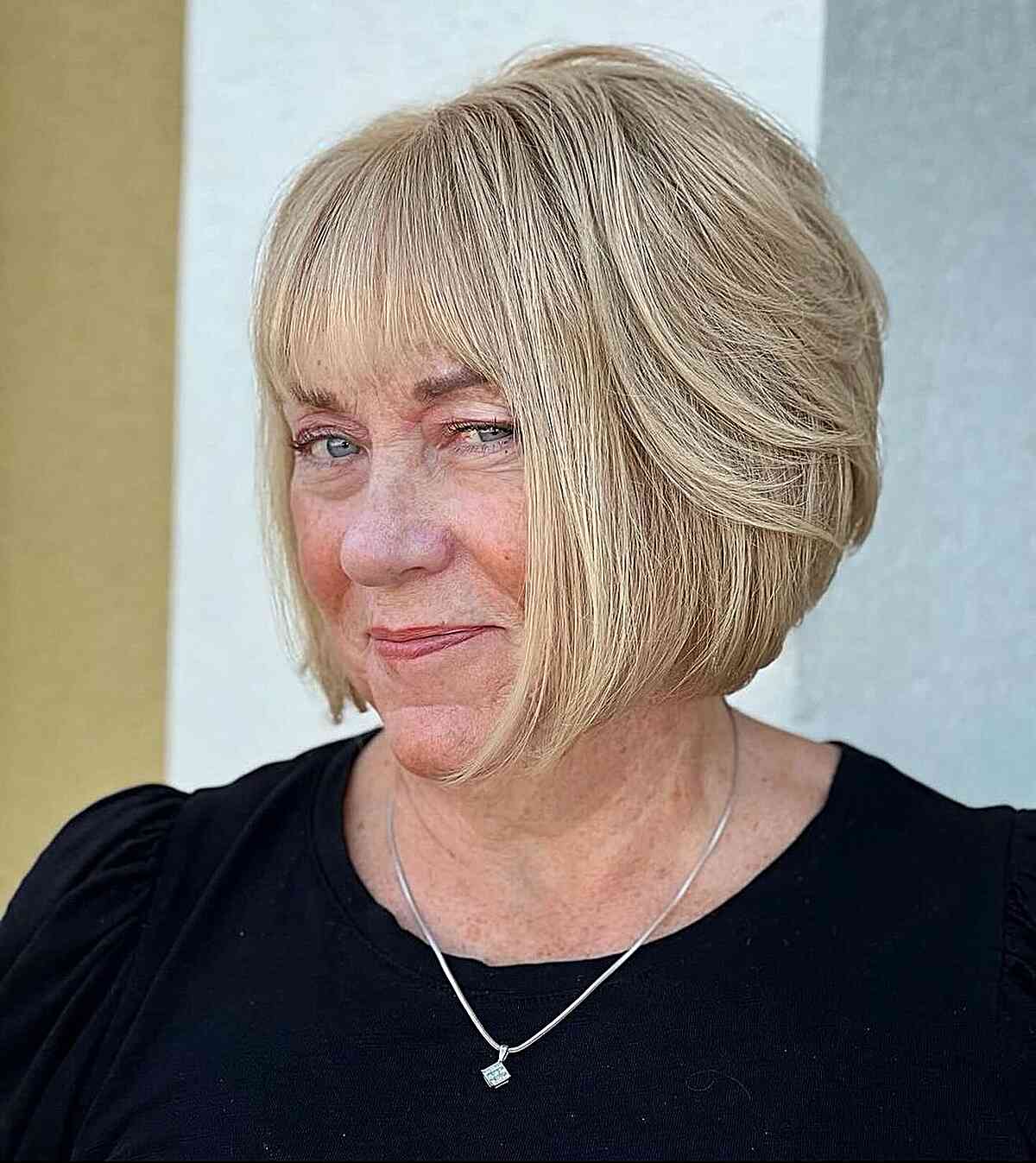 Short Face-Framing Angled Thick Bob with Layers on Senior Ladies Over Sixty