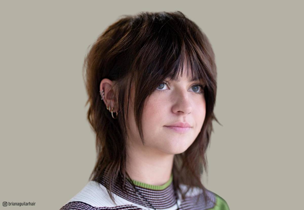 Image of Face framing shag haircut with side-swept bangs