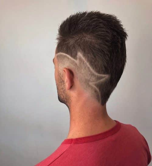 A imitation hawk fade is a type of fade that complements a imitation hawk hairstyle yesteryear adding contra xv Lit Faux Hawk Fade Haircuts for Guys