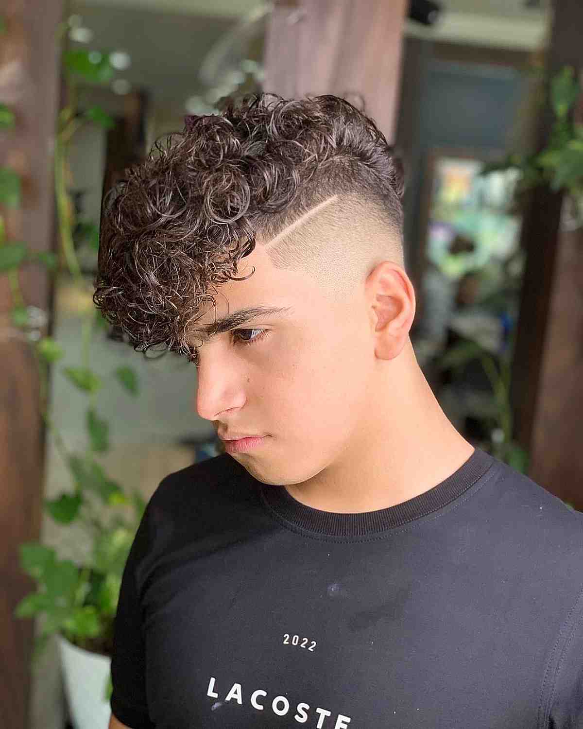 Fancy Curls with Tapered Design and Bangs for Guys