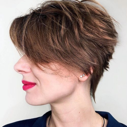 A pixie cutting alongside bangs is a brusk haircut betwixt i one-half to iii inches long that is st xix Cute Ways to Have a Pixie Cut alongside Bangs