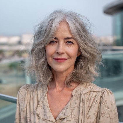 Soft Layered Gray Hair with Subtle Lowlights