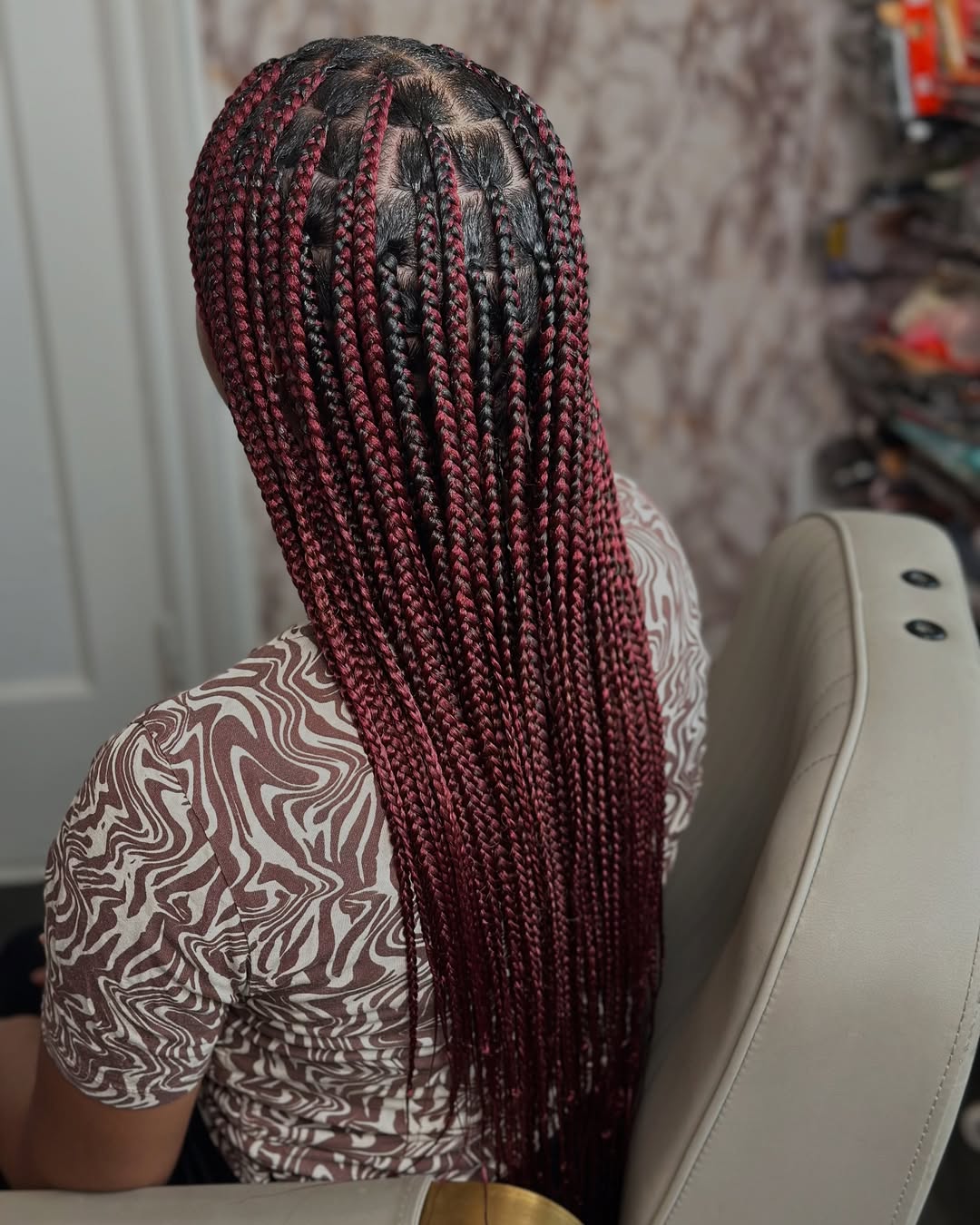 Bold Burgundy Knotless Box Braids with Intricate Parting