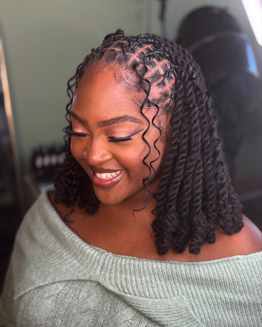 Chic Medium-Length Knotless Box Braids with Playful Spirals
